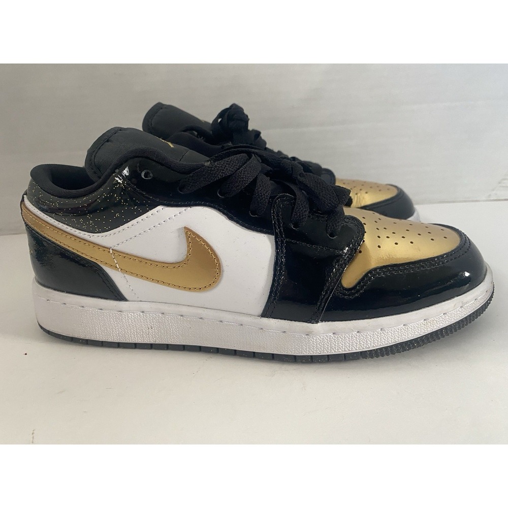 NIKE AIR JORDAN 1 LOW OG BLACK WHITE GOLD TOE. Size 7Y